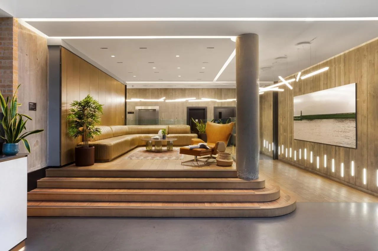 a living room with a couch and a table at Native Bankside in London